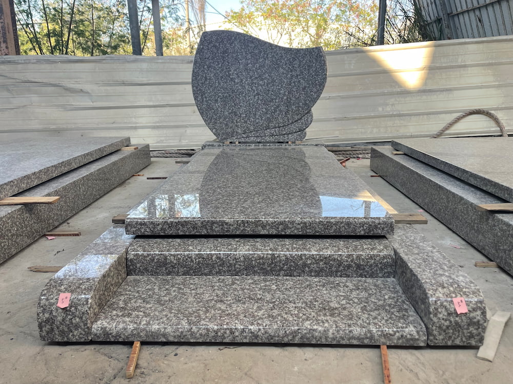 G664 Curved French Monument in pink granite - front view