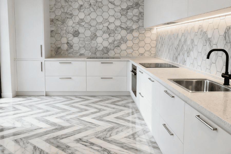 Kitchen uses herringbone and hexagonal marble patterns Kitchen uses herringbone and hexagonal marble patterns