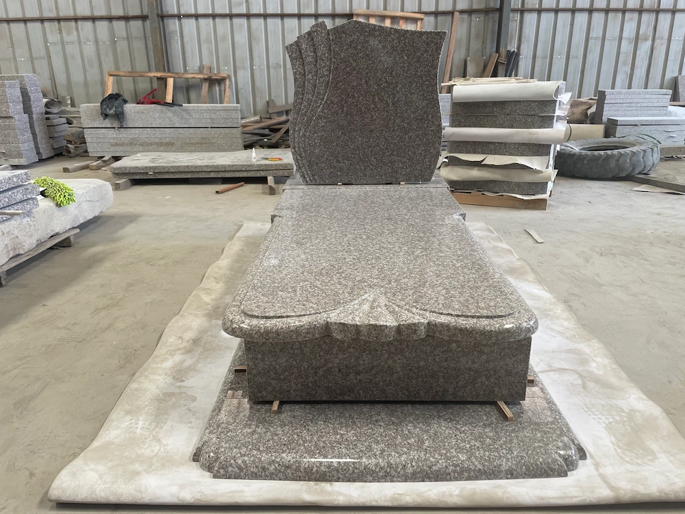G664 Polish-style layered wave headstone with full ledger cover and raised base