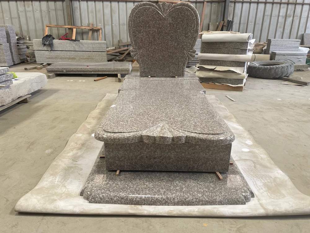 G664 Polish-style granite heart headstone with full ledger cover and raised base