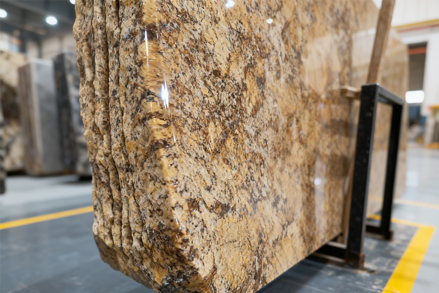 Macro shot of granite edge finishing showing polish detail and reflective surface.