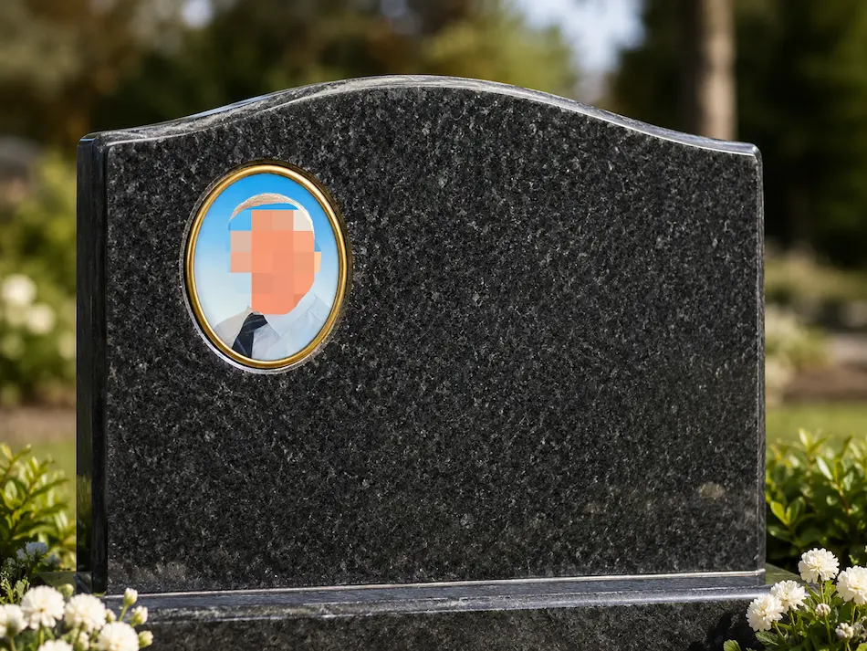 Custom ceramic portrait embedded in a granite headstone for memorial monument applications