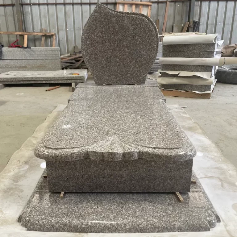 G664 Polish-style granite wave headstone with full ledger cover and raised base