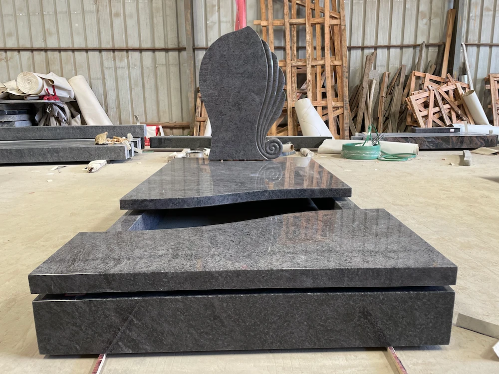 Bahama Blue Granite German-Style Leaf Headstone with Full Ledger Cover and Curved Side Detail