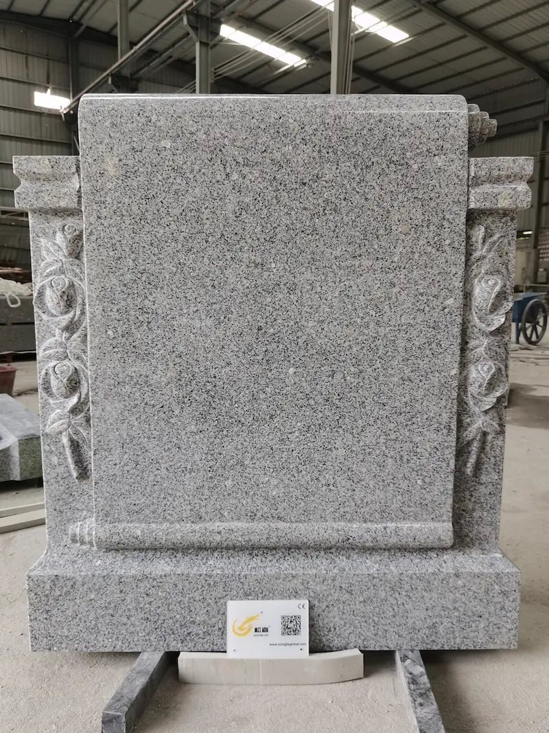 G603 granite flower carving headstone with side columns and central inscription panel