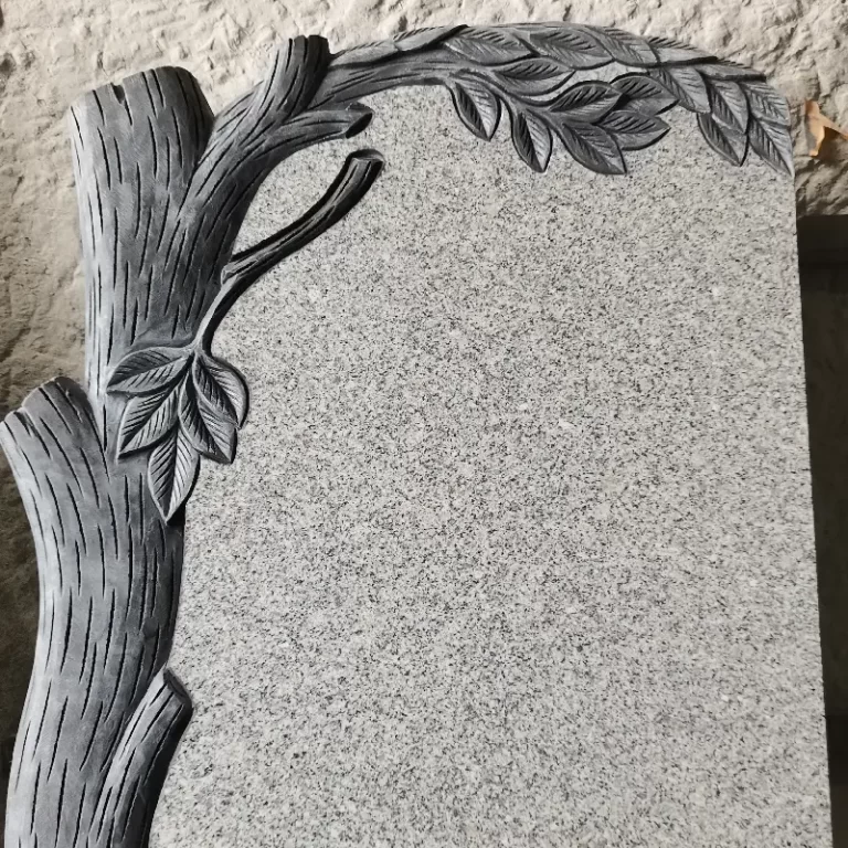 G603 granite tree carving headstone with curved inscription panel and leaf detail