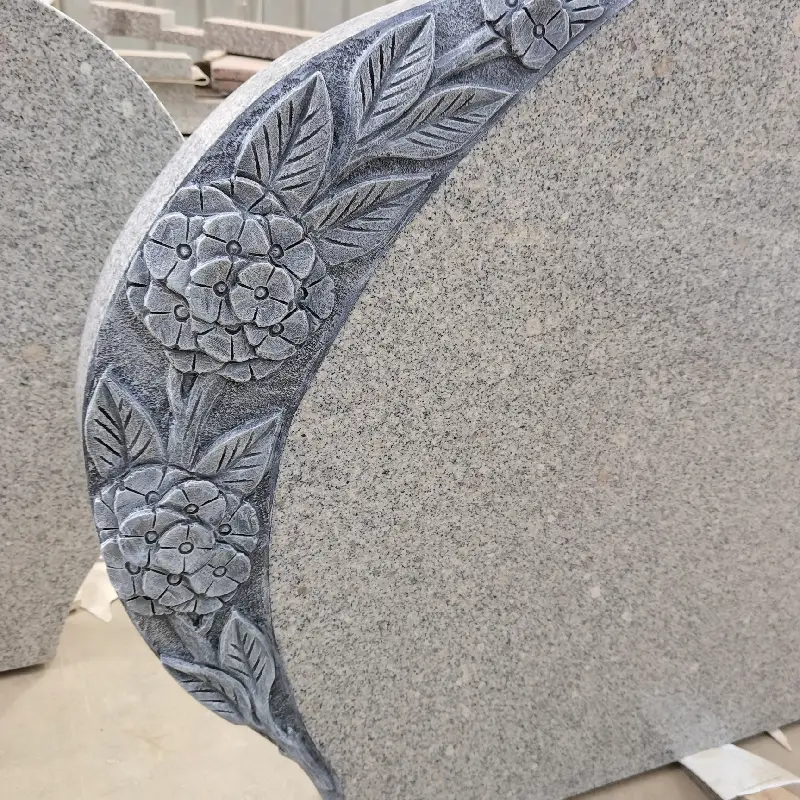 G603 granite flower carving headstone with curved inscription panel and leaf detail